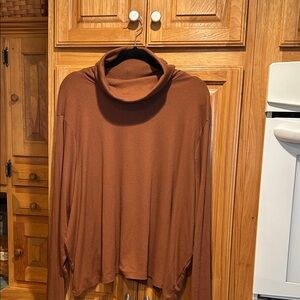 Turtleneck, soft and roomy with thumb holes; Great for layering!